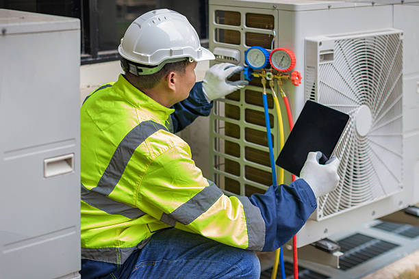 Professional Hvac technician working in Middle Village, NY